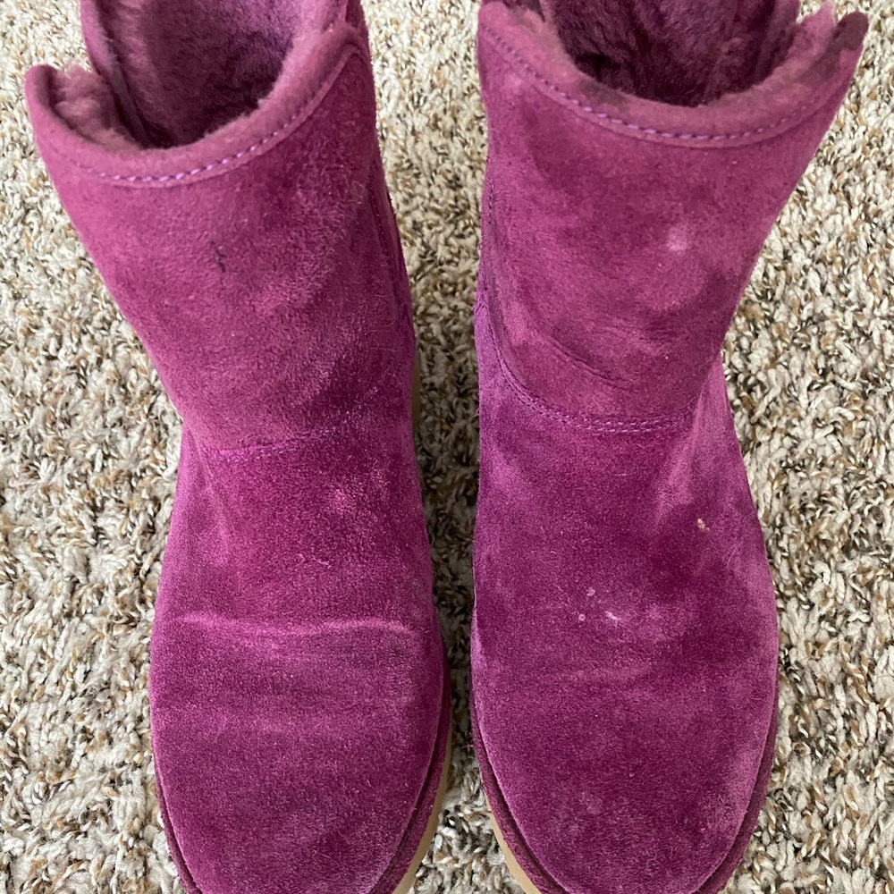 Pink Ugg boots.